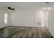 Bright living room with vinyl plank flooring and ceiling fan at 604 W 12Th St, Lakeland, FL 33805