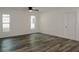 Bright bedroom with hardwood floors and ceiling fan at 604 W 12Th St, Lakeland, FL 33805