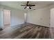 Spacious bedroom with walk-in closet and ceiling fan at 604 W 12Th St, Lakeland, FL 33805