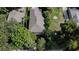 An aerial shot of a house surrounded by lush greenery at 604 W 12Th St, Lakeland, FL 33805