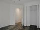 Bright bedroom with wood-look floors and a large closet at 604 W 12Th St, Lakeland, FL 33805