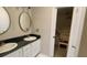 Double vanity bathroom with walk-in closet at 13659 Sw 115Th Pl, Dunnellon, FL 34432
