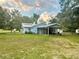 Ranch style home with carport and large yard at 13659 Sw 115Th Pl, Dunnellon, FL 34432