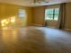 Large bedroom with wood-look tile floors and neutral walls at 13659 Sw 115Th Pl, Dunnellon, FL 34432