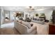 Spacious living room features plush seating and an open floor plan at 4046 Dinner Lake Way, Lake Wales, FL 33859