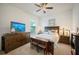 Bright bedroom featuring a king-size bed and plenty of storage space at 4046 Dinner Lake Way, Lake Wales, FL 33859