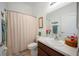 Clean bathroom with shower/tub combo and updated vanity at 4046 Dinner Lake Way, Lake Wales, FL 33859