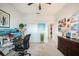 Bright home office features built-in shelving, desk, and ample natural light at 4046 Dinner Lake Way, Lake Wales, FL 33859