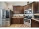 Modern kitchen with stainless steel appliances and ample cabinetry at 4046 Dinner Lake Way, Lake Wales, FL 33859