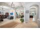 Open concept entryway leading to living and dining areas at 4046 Dinner Lake Way, Lake Wales, FL 33859