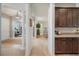 Bright hallway with columns and views into living and dining areas at 4046 Dinner Lake Way, Lake Wales, FL 33859