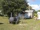 Large backyard with detached garage and smoker at 6638 Hatcher Rd, Lakeland, FL 33811