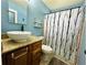 Updated bathroom with vessel sink, granite vanity, and shower at 6004 Hilltop E Ln, Lakeland, FL 33809
