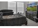Bedroom with double bed, large dresser, and TV at 7474 Sw 78Th Ter, Ocala, FL 34481