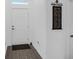 Bright entryway with tiled floor and decorative wall art at 7474 Sw 78Th Ter, Ocala, FL 34481