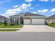 Beautiful two-story house with a three-car garage at 7474 Sw 78Th Ter, Ocala, FL 34481