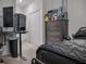 Bedroom with double bed, dresser, and closet at 7474 Sw 78Th Ter, Ocala, FL 34481