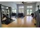 Well-equipped fitness center with various weight machines and free weights at 1126 Whitewater Bay Dr, Groveland, FL 34736