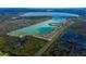 Aerial view of community near a large lake at 1126 Whitewater Bay Dr, Groveland, FL 34736