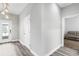 Light and airy entryway with view into living room at 1126 Whitewater Bay Dr, Groveland, FL 34736