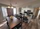 Dining room with large table and kitchen access at 2729 N Poinciana Blvd # 117, Kissimmee, FL 34746