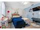 Bedroom with light blue walls and a comfortable bed at 4314 Ridge Rd, Lakeland, FL 33811