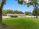 Large backyard with a swing set and plenty of space for outdoor activities at 4314 Ridge Rd, Lakeland, FL 33811