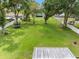 Expansive backyard with a large lawn and playground equipment at 4314 Ridge Rd, Lakeland, FL 33811