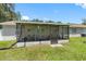Screened patio with backyard view at 4314 Ridge Rd, Lakeland, FL 33811