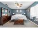 Spacious bedroom with ceiling fan, large bed, and plenty of natural light at 4314 Ridge Rd, Lakeland, FL 33811