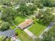 Aerial view of a single-story house with a large backyard and spacious driveway at 4314 Ridge Rd, Lakeland, FL 33811
