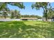 Large grassy backyard with mature trees at 4314 Ridge Rd, Lakeland, FL 33811