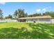 Spacious backyard with grassy area at 4314 Ridge Rd, Lakeland, FL 33811