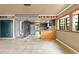 Spacious dining area with a modern chandelier and wood accents at 6318 Cedar Ln, Lakeland, FL 33813