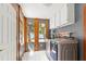 Laundry room with washer, dryer, and built-in cabinets at 6318 Cedar Ln, Lakeland, FL 33813