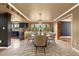 Open concept dining area with modern chandelier at 6318 Cedar Ln, Lakeland, FL 33813