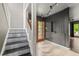 Bright entryway with patterned stairs and wood flooring at 6318 Cedar Ln, Lakeland, FL 33813