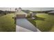 Newly built home with metal roof and large yard at 7031 Red Grange Boulevard Ave, Indian Lake Estates, FL 33855