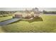 Newly built home with metal roof and large yard at 7031 Red Grange Boulevard Ave, Indian Lake Estates, FL 33855