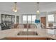 Kitchen island with sink overlooking a living room and city views at 231 Riverside Dr # 709, Daytona Beach, FL 32117