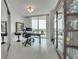 Bright home office with built-in shelving and city views at 231 Riverside Dr # 709, Daytona Beach, FL 32117