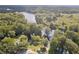 Aerial view of riverfront property with lush trees at 3603 Cr 626N, Bushnell, FL 33513