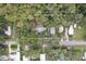 Aerial view showing a home nestled among lush greenery at 3603 Cr 626N, Bushnell, FL 33513