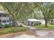 Two houses, one with a circular room, on a wooded lot at 3603 Cr 626N, Bushnell, FL 33513