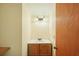 Small bathroom with single vanity and toilet at 3603 Cr 626N, Bushnell, FL 33513