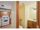 Small bathroom with wood vanity and toilet at 3603 Cr 626N, Bushnell, FL 33513