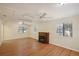Spacious bedroom with hardwood floors and fireplace at 3603 Cr 626N, Bushnell, FL 33513