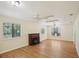 Spacious bedroom with hardwood floors and dual ceiling fans at 3603 Cr 626N, Bushnell, FL 33513