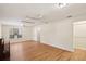 Large bedroom with hardwood floors and access to closet at 3603 Cr 626N, Bushnell, FL 33513
