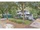 House exterior with carport and mature landscaping at 3603 Cr 626N, Bushnell, FL 33513